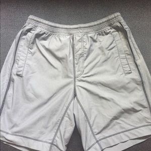 Never worn Lululemon men’s workout shorts